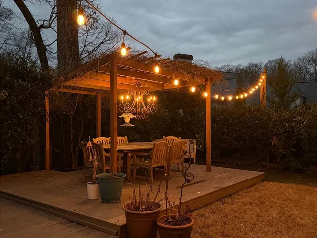 a view of an outdoor space with table and chairs