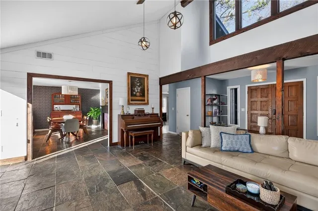 a view of game room with window and couch