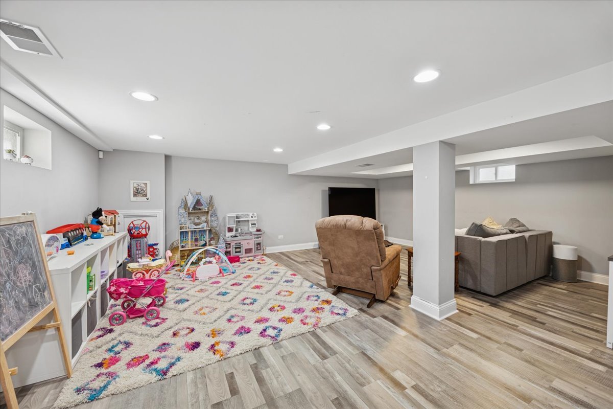 3931 Maple Avenue Brookfield, IL 60513 - Photo 18 of 24 a bed room with a bed and a desk