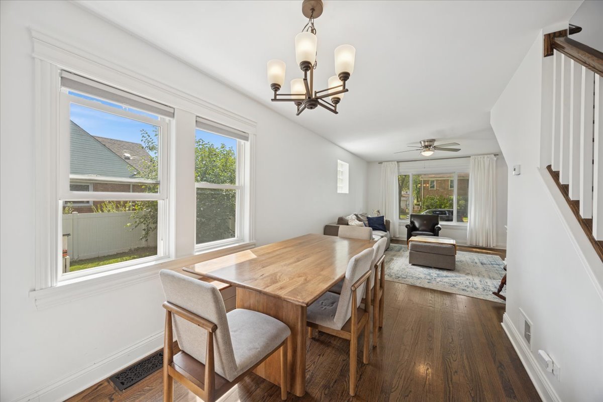 3931 Maple Avenue Brookfield, IL 60513 - Photo 5 of 24 a view of a dining room with furniture window and wooden floor