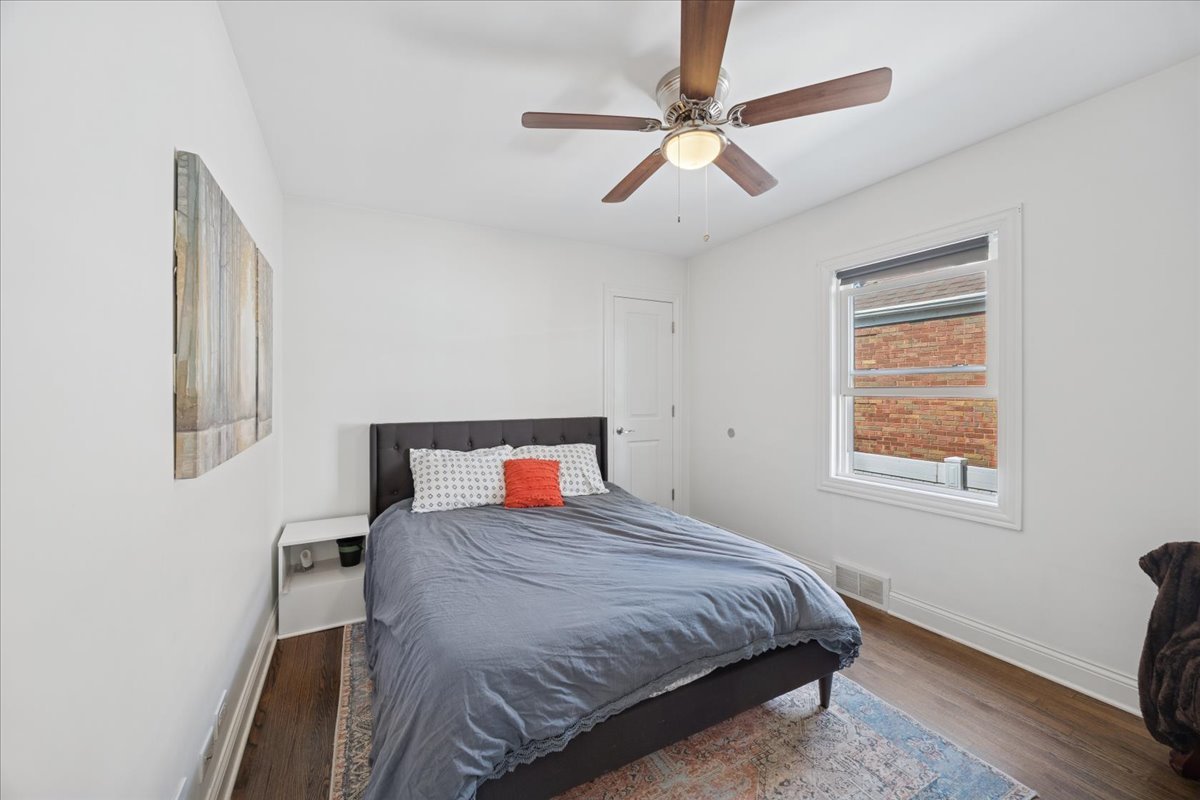 3931 Maple Avenue Brookfield, IL 60513 - Photo 10 of 24 a bedroom with a bed and a window