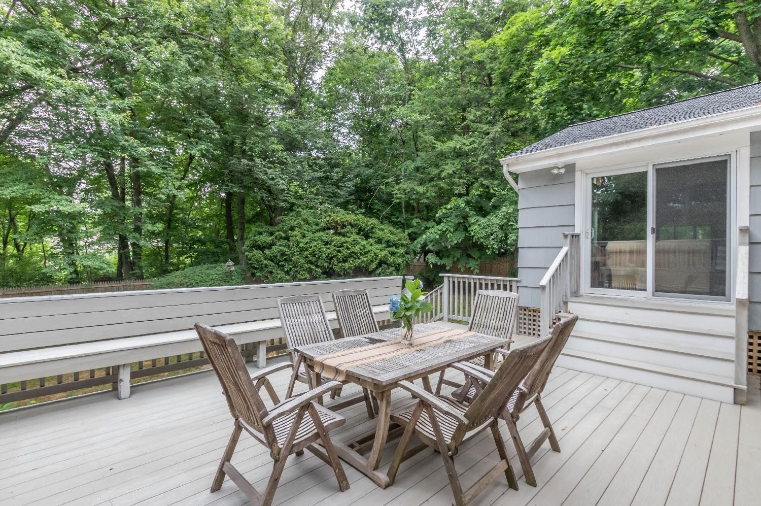 9 Sheffield Road Norwalk, CT 06853 - Photo 5 of 29 a view of a patio with a table and chairs