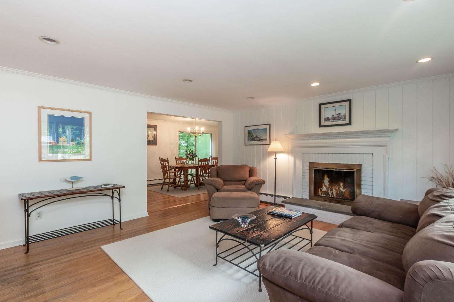9 Sheffield Road Norwalk, CT 06853 - Photo 8 of 29 a living room with furniture and a fireplace