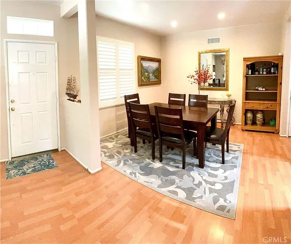 a view of a dining room with furniture