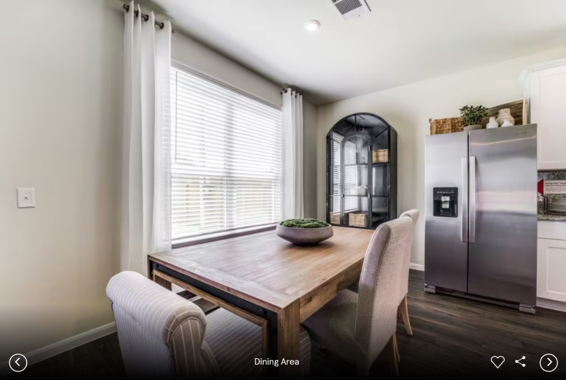 396 Begonia Street Buda, TX 78610 - Photo 4 of 10 a view of a dining room with furniture and window