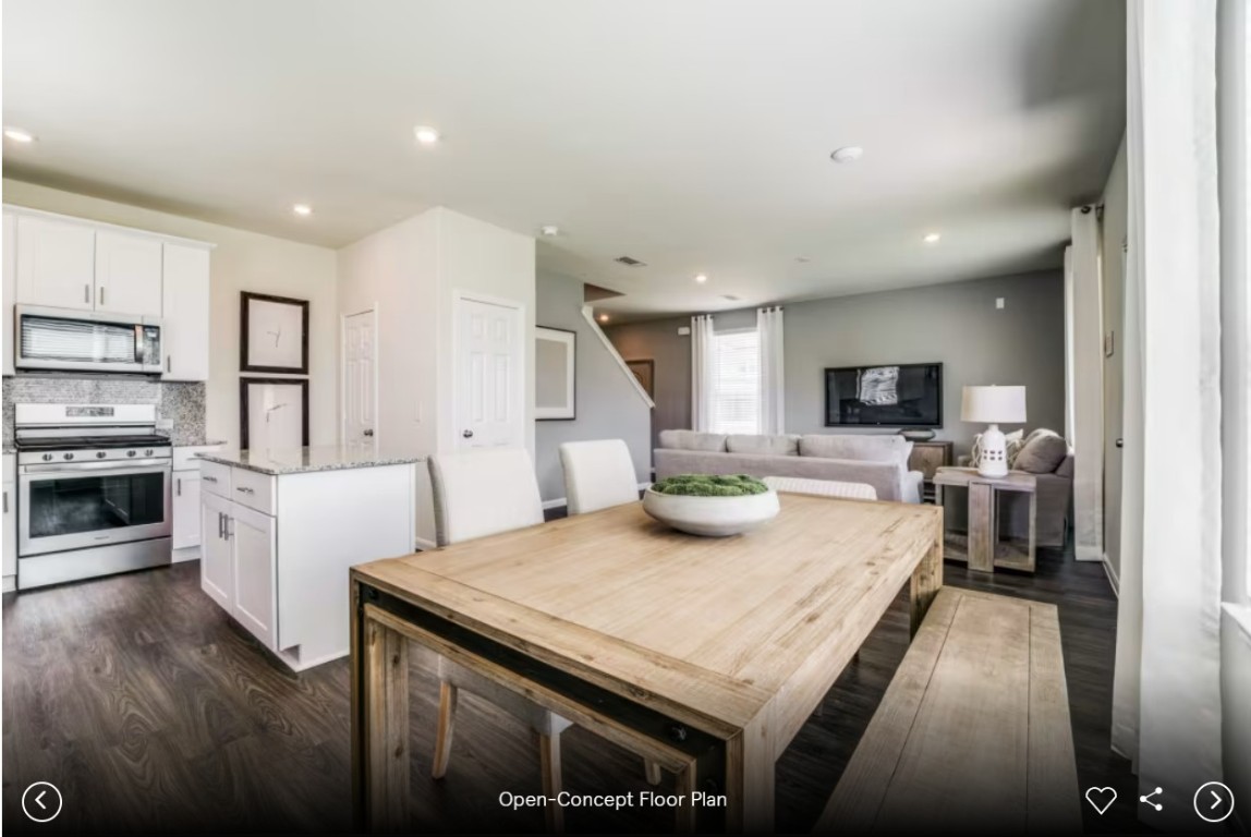 396 Begonia Street Buda, TX 78610 - Photo 10 of 10 a kitchen with sink refrigerator and microwave