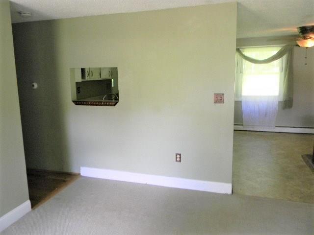 26 Keith Street Chelsea, ME 04330 - Photo 3 of 25 Pass through window from kitchen...