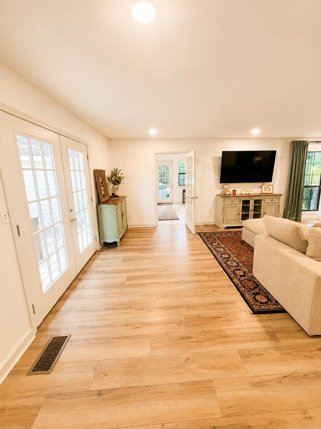 470 Rich Road Somerville, TN 38068 - Photo 19 of 40 Open-concept living space featuring wood-finish flooring, recessed lighting, and white trim