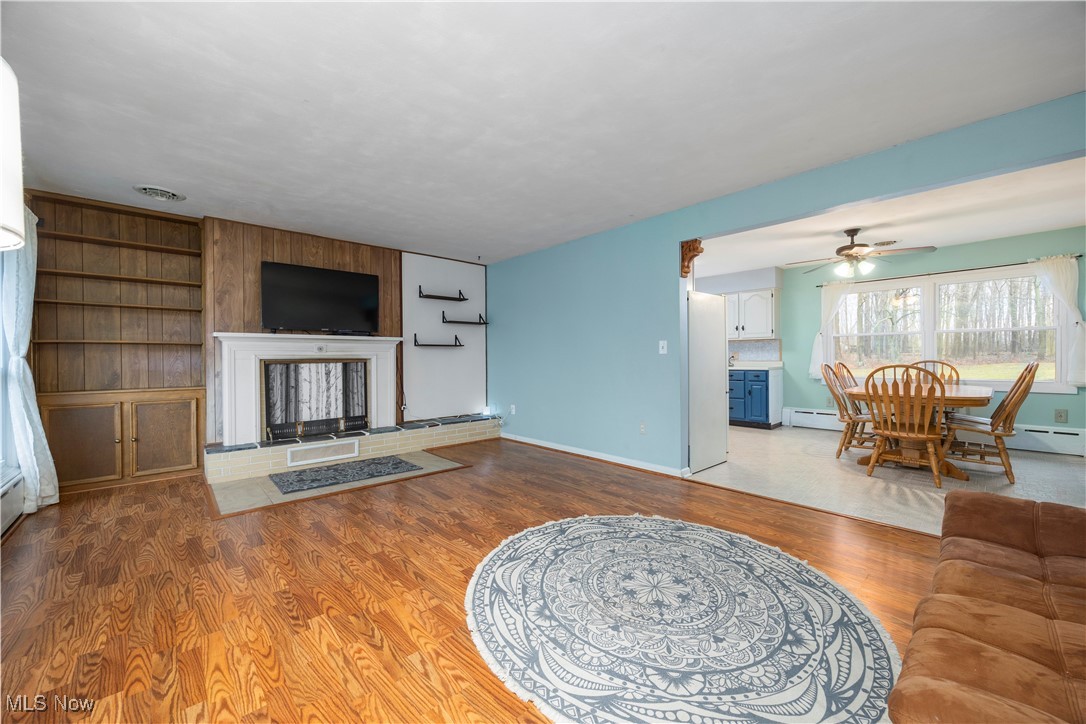 14312 Butler Road Wakeman, OH 44889 - Photo 2 of 42 Living room, wood burning fireplace