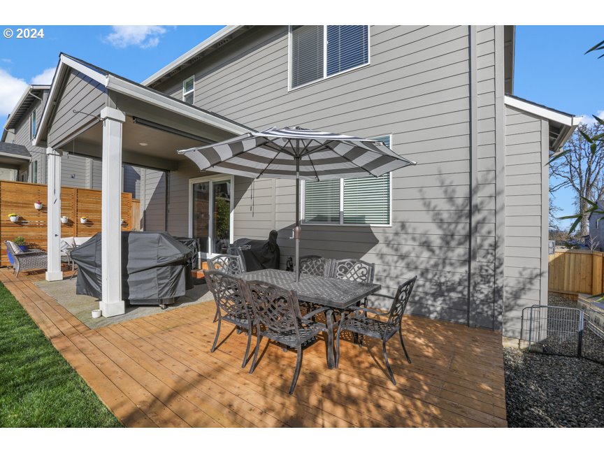 59551 Emerald Loop St. Helens, OR 97051 - Photo 17 of 40 a view of house with backyard and sitting area