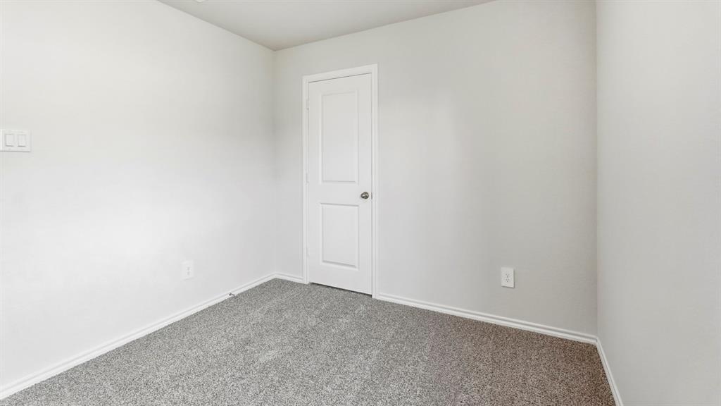 3535 Spring Time Street Forney, TX 75126 - Photo 19 of 23 Neutral wall paint with textured carpet flooring