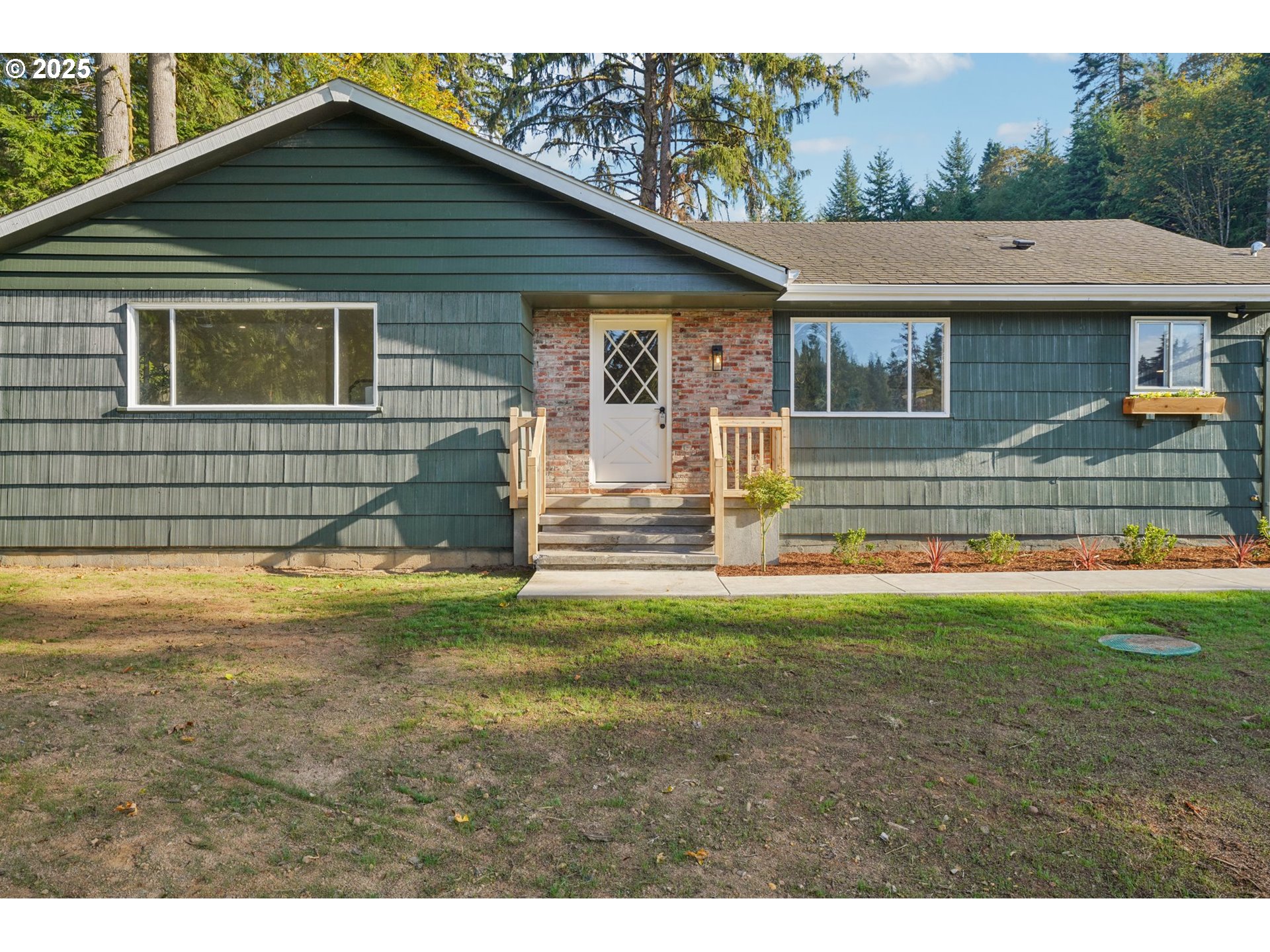 72 Whitewater Road Longview, WA 98632 - Photo 3 of 47 a view of a house with a backyard