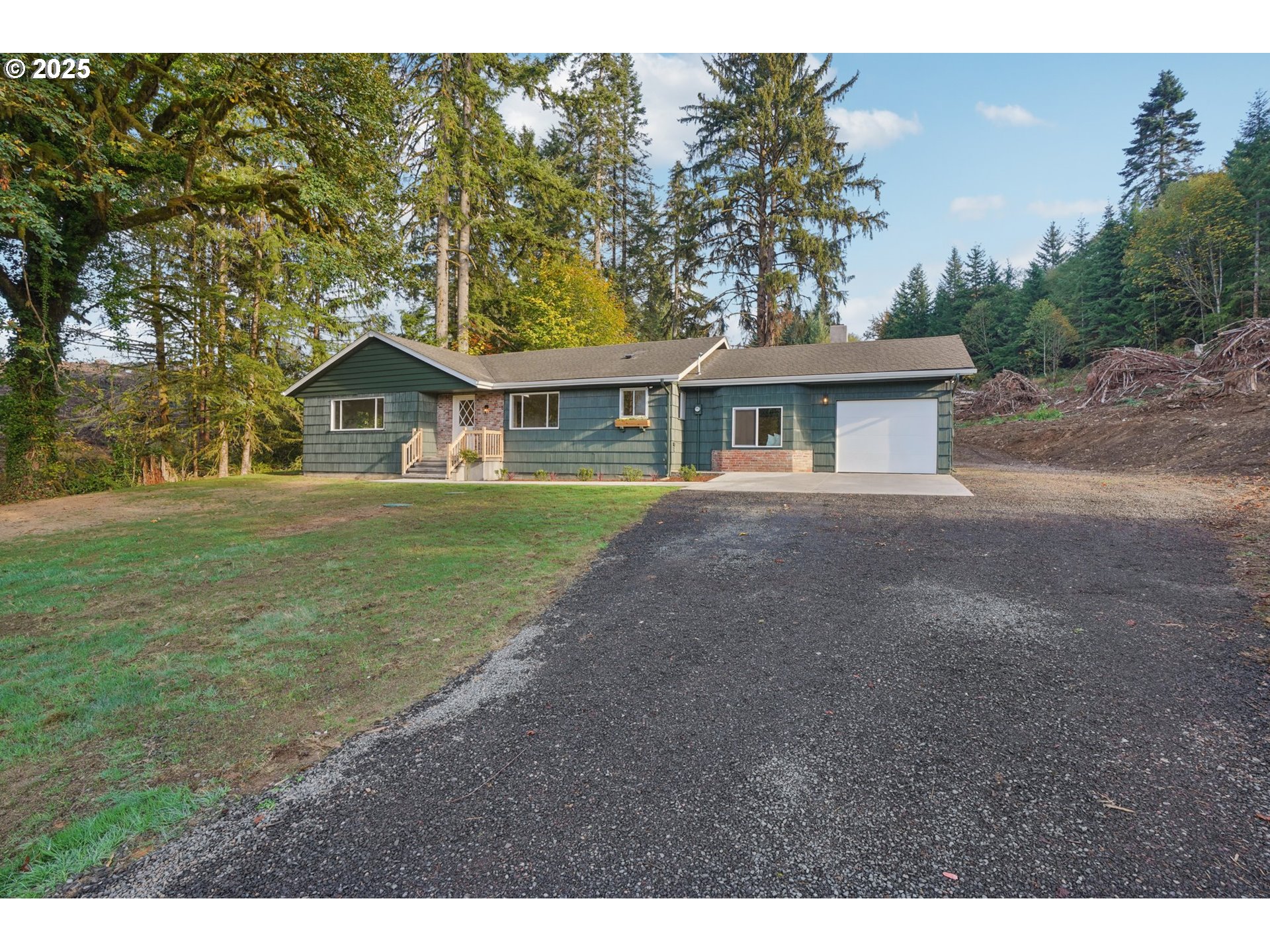 72 Whitewater Road Longview, WA 98632 - Photo 37 of 47 a front view of a house with a yard and trees