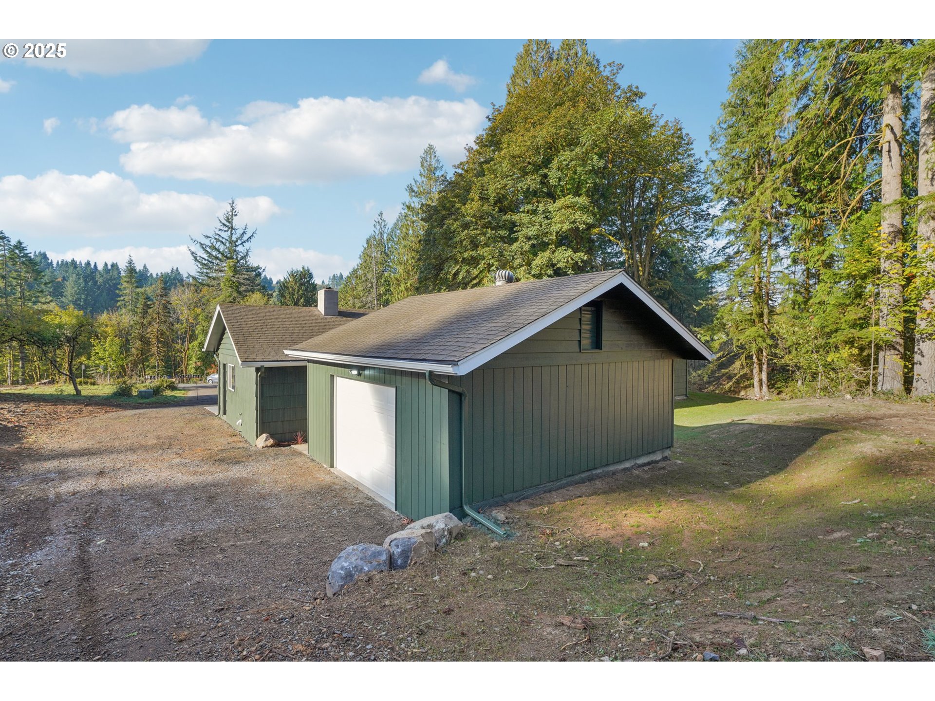 72 Whitewater Road Longview, WA 98632 - Photo 42 of 47 a backyard of a house with large trees and fence