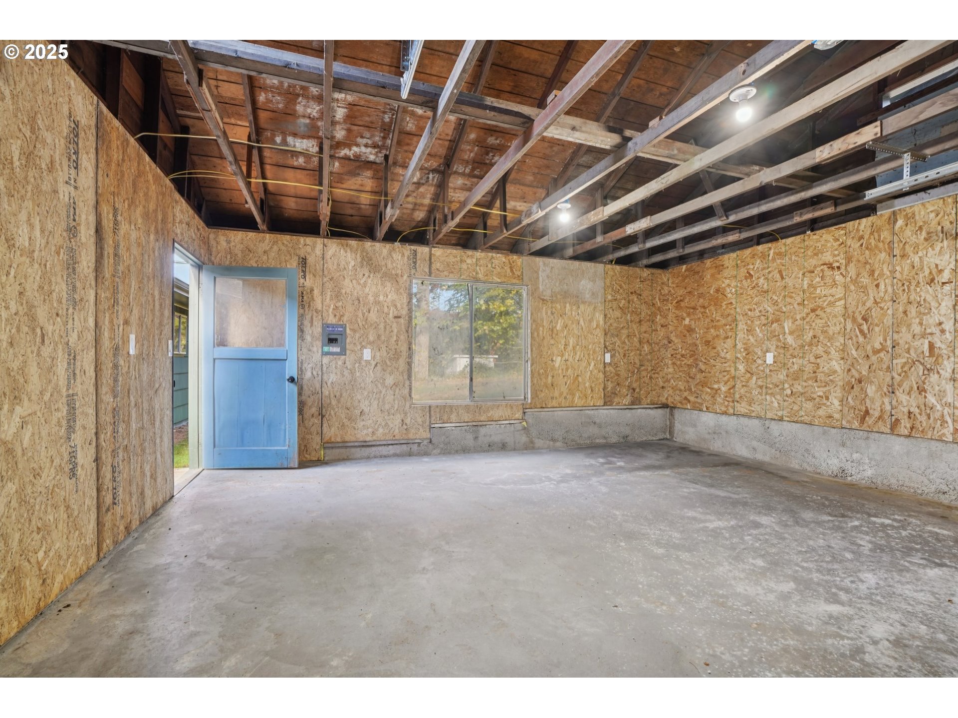 72 Whitewater Road Longview, WA 98632 - Photo 44 of 47 a big room with wooden walls