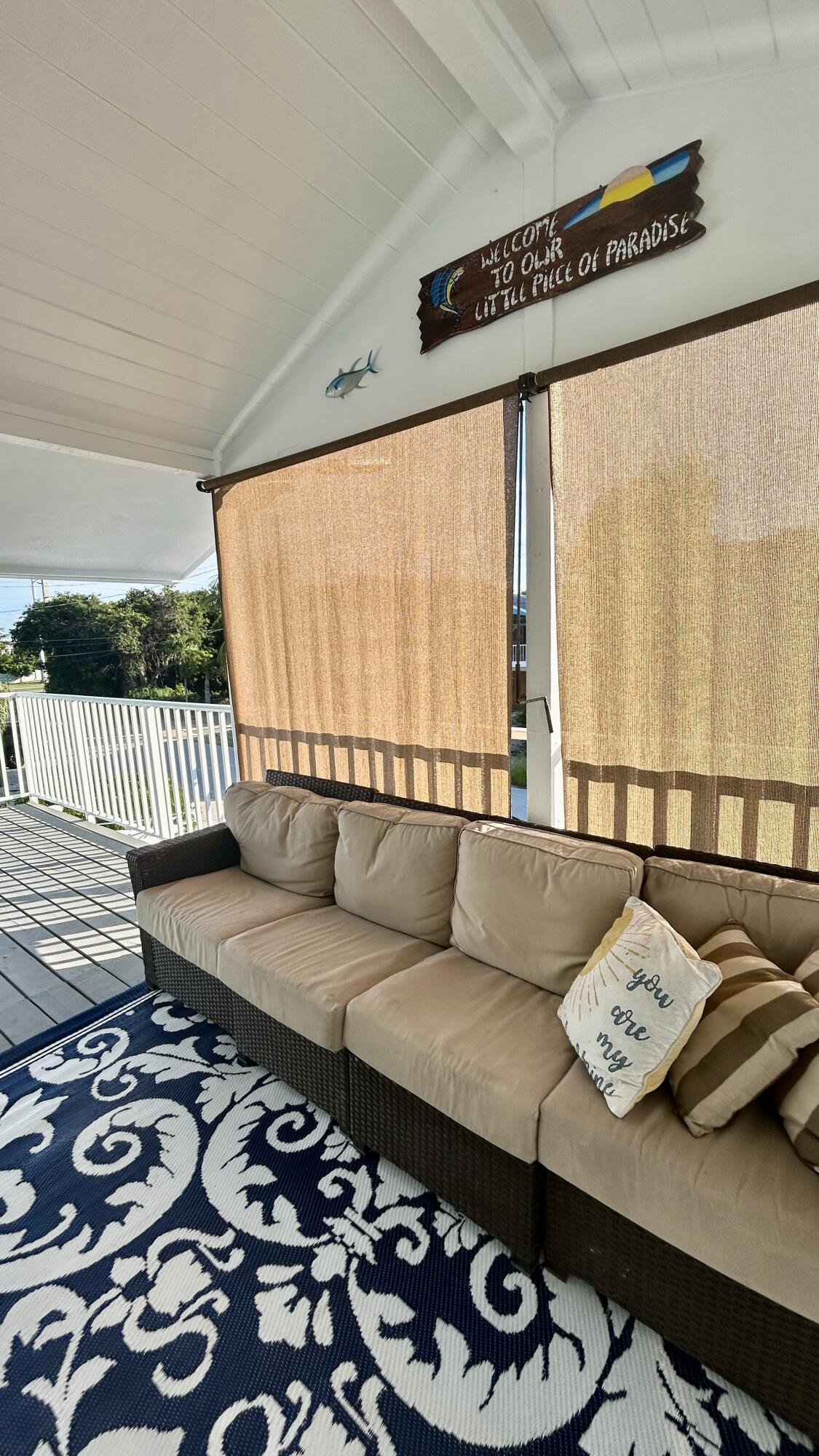 423 Mahogany Avenue Key Largo, FL 33037 - Photo 14 of 37 a living room with a couch and a table