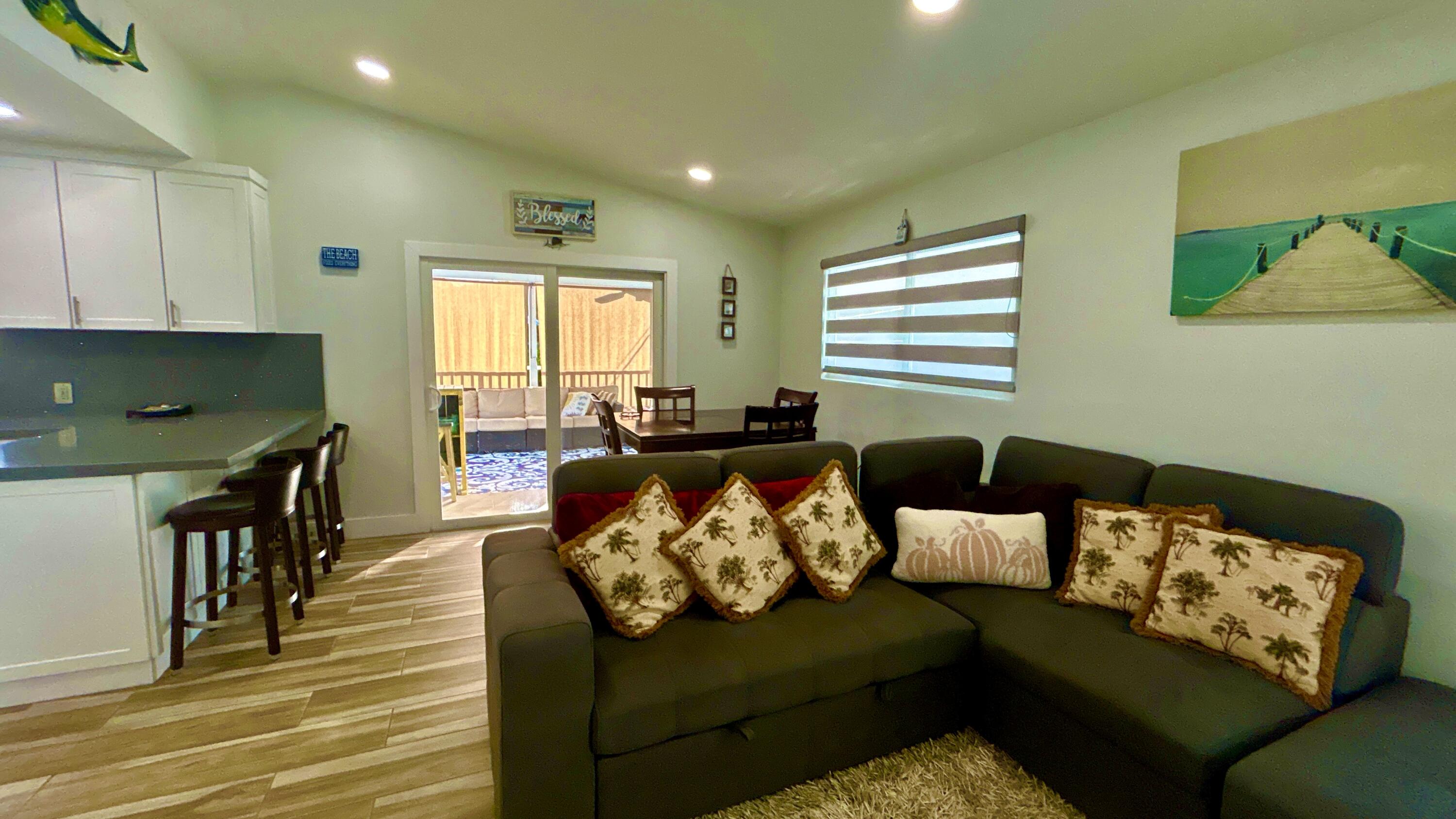 423 Mahogany Avenue Key Largo, FL 33037 - Photo 19 of 37 a living room with furniture and a window
