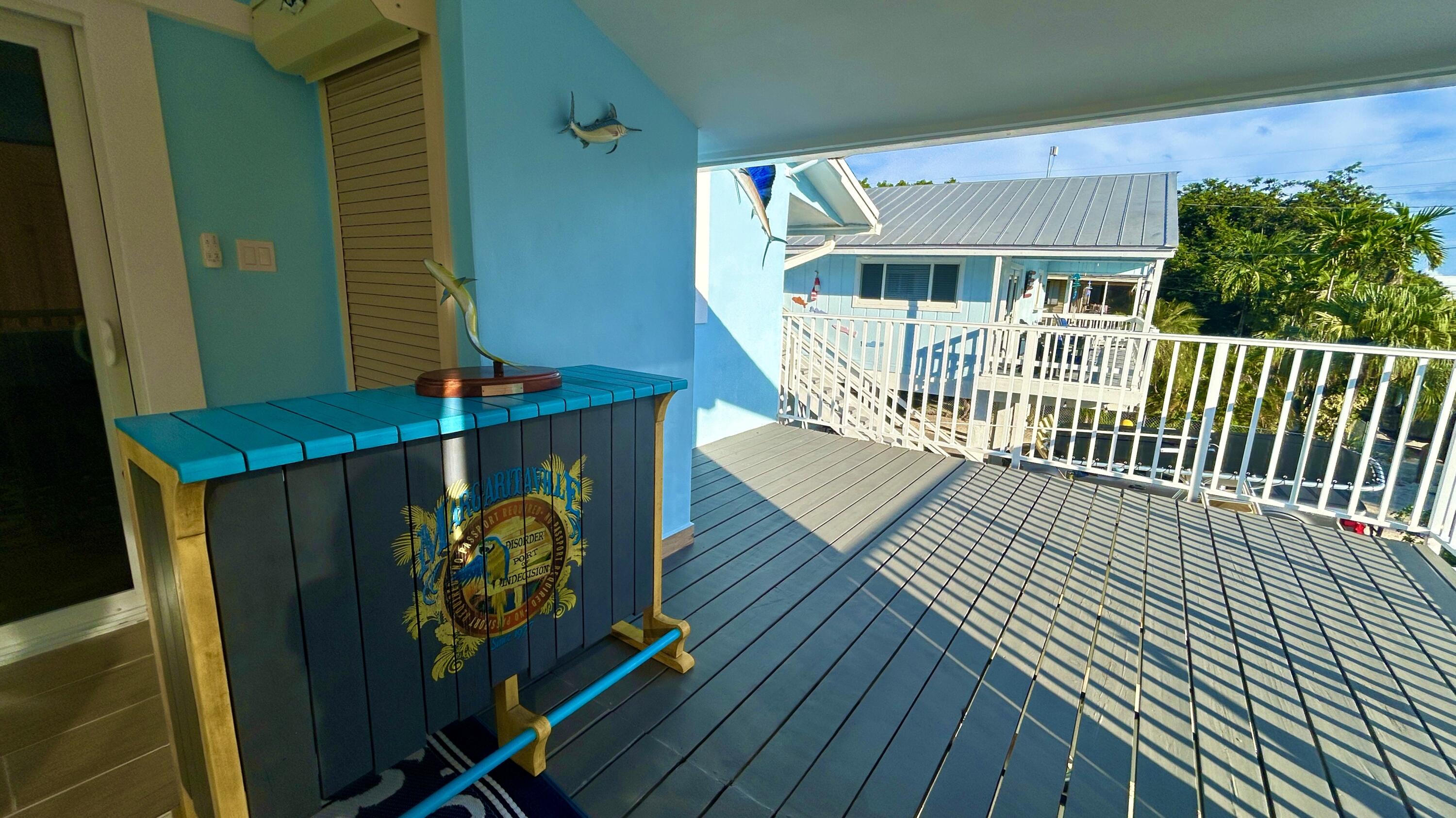 423 Mahogany Avenue Key Largo, FL 33037 - Photo 2 of 37 a view of deck with patio