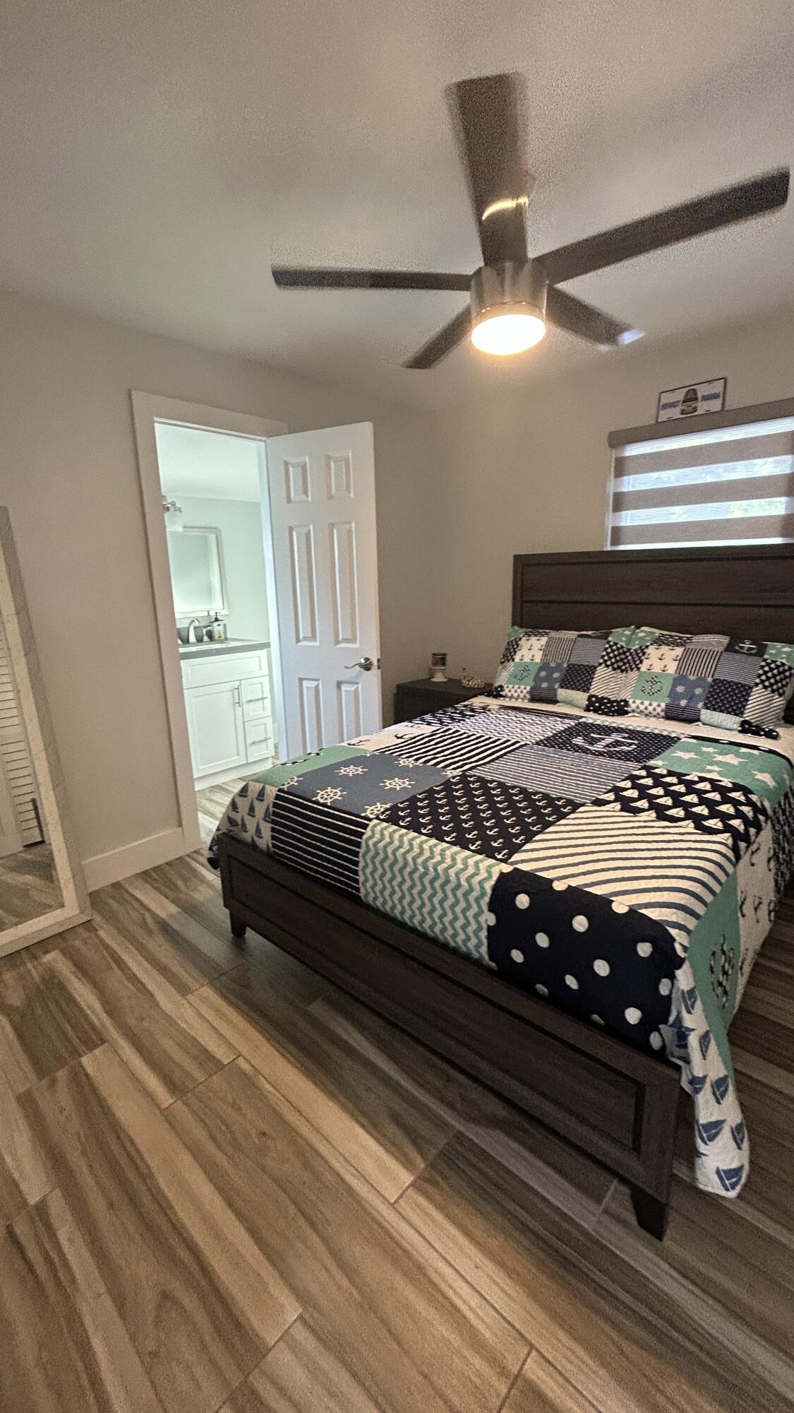 423 Mahogany Avenue Key Largo, FL 33037 - Photo 25 of 37 a bedroom with a bed and window