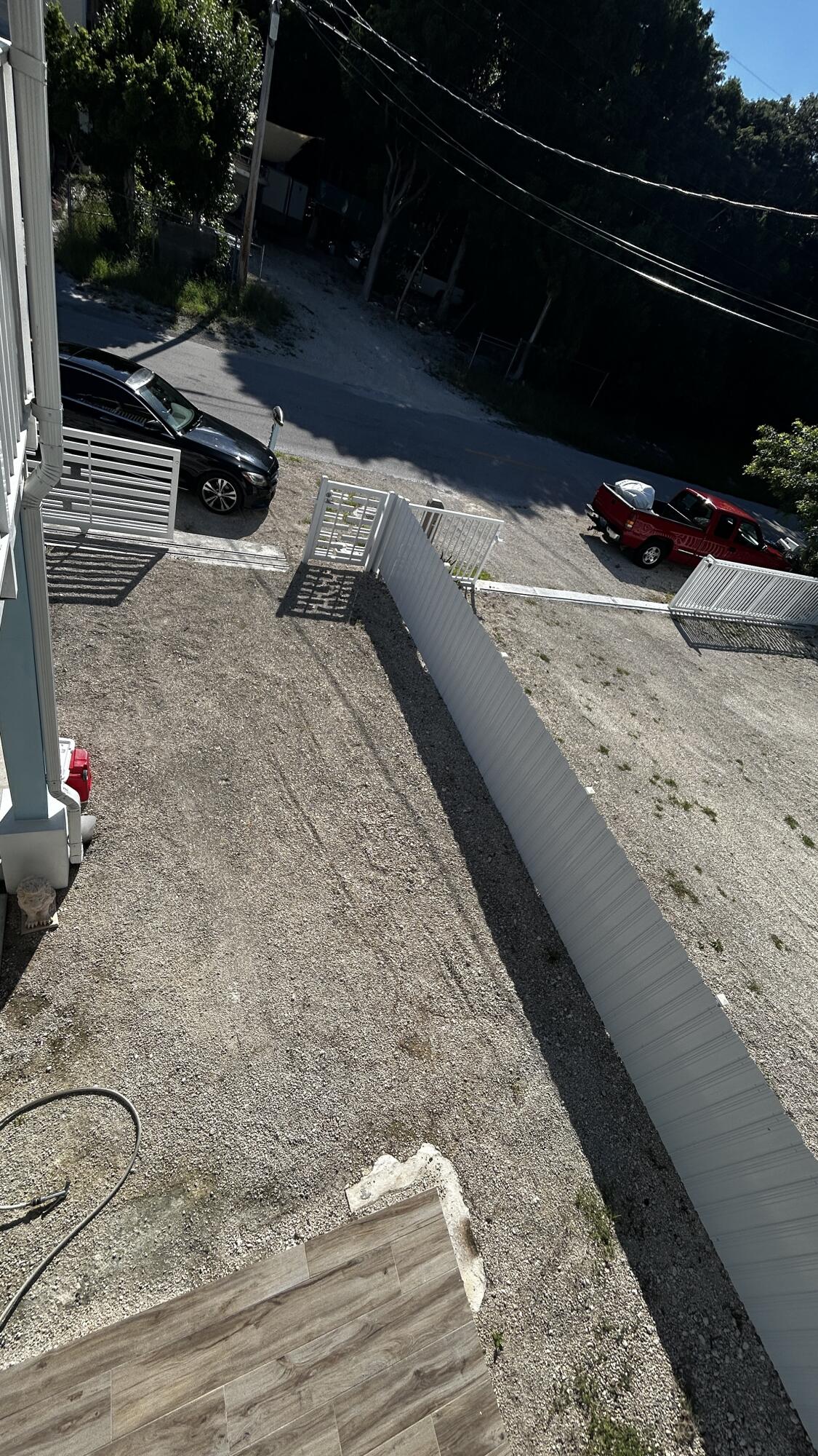 423 Mahogany Avenue Key Largo, FL 33037 - Photo 27 of 37 a view of a backyard of the house