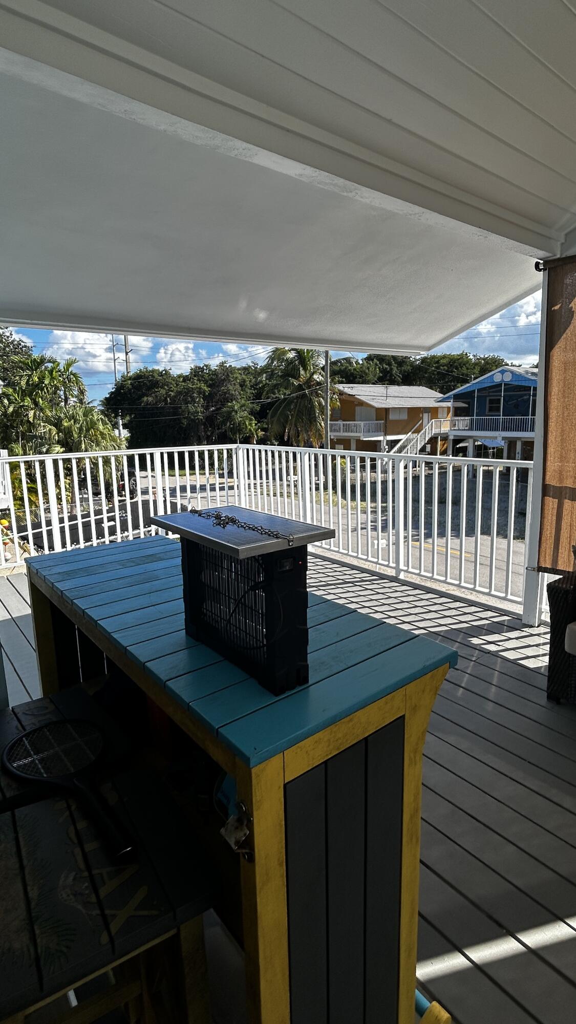 423 Mahogany Avenue Key Largo, FL 33037 - Photo 30 of 37 a view of balcony with wooden floor