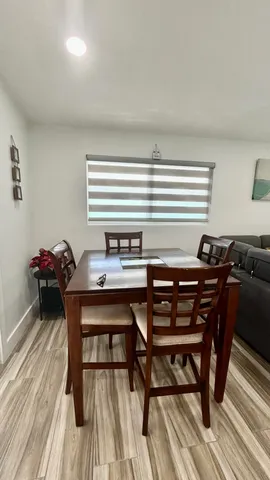 a front view of a house with parking space