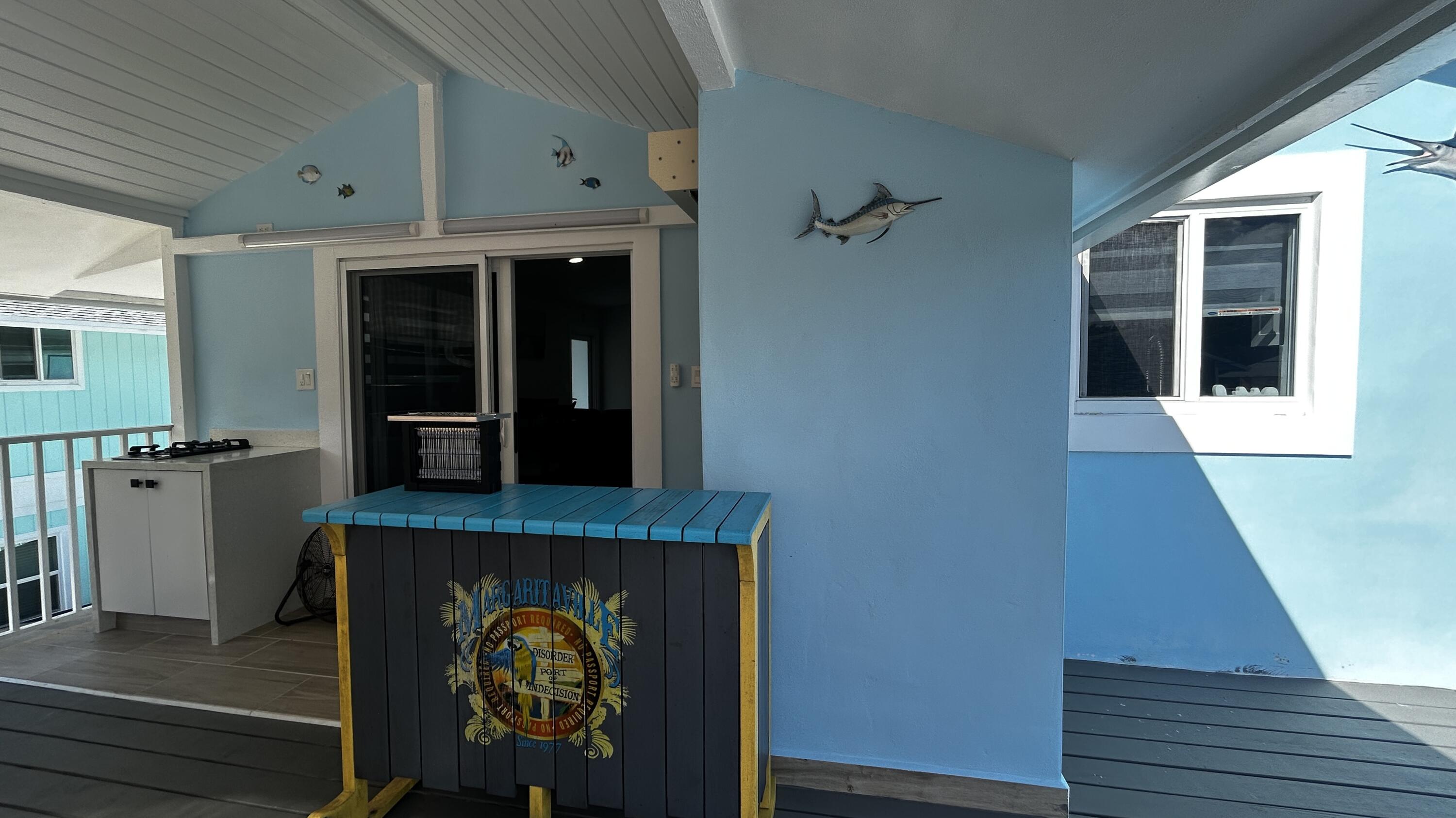 423 Mahogany Avenue Key Largo, FL 33037 - Photo 6 of 37 a front view of a house with entryway