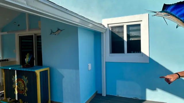 a kitchen with stainless steel appliances granite countertop a sink and a stove