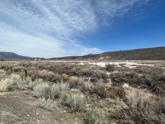 a view of ocean and mountains