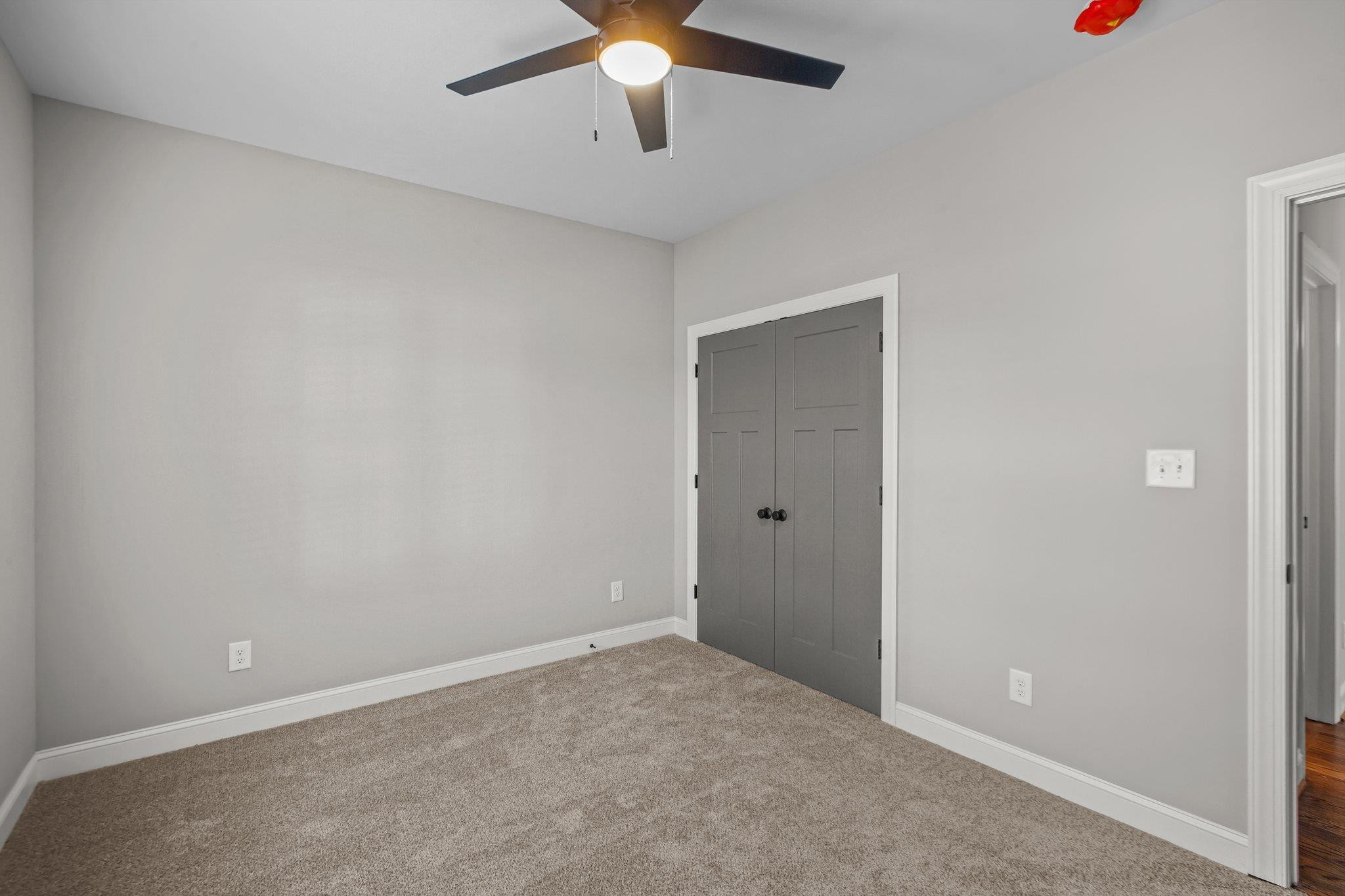 5726 Harvest Rdg Road Battleboro, NC 27809 - Photo 22 of 32 an empty room with a ceiling fan and a window