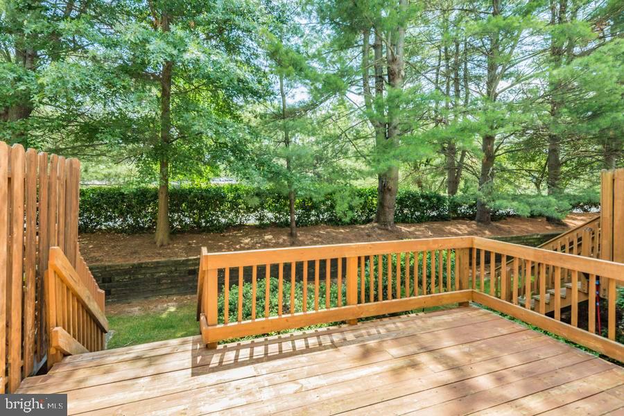 20 Exeter Court Princeton, NJ 08540 - Photo 2 of 25 a view of a wooden deck next to a yard