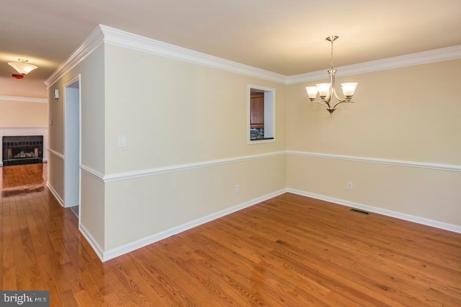 20 Exeter Court Princeton, NJ 08540 - Photo 5 of 25 wooden floor in an empty room with a window