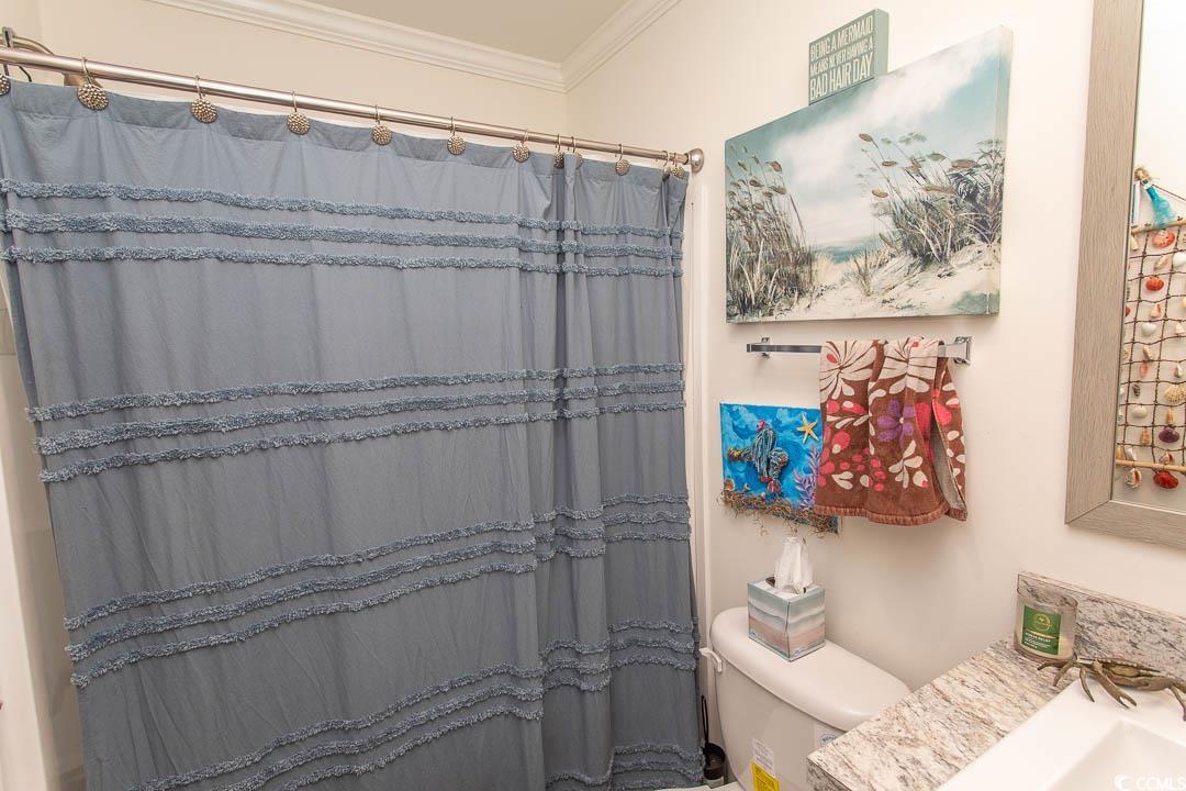 2737 Capricorn Drive Myrtle Beach, SC 29575 - Photo 20 of 27 Bathroom with crown molding and curtained shower