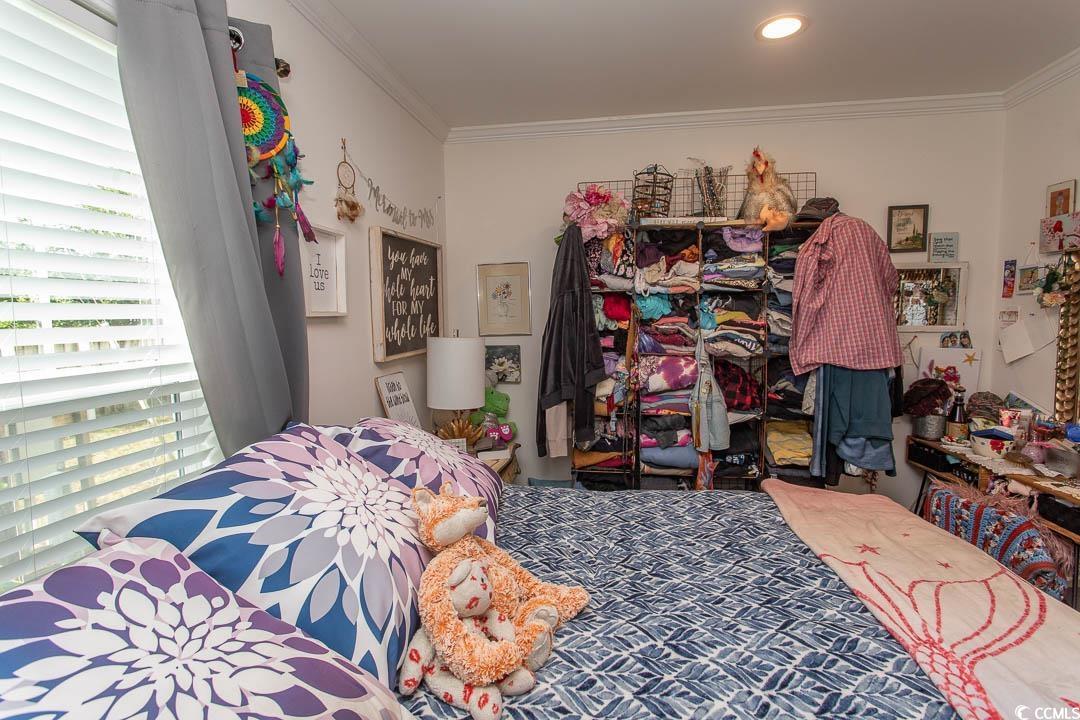 2737 Capricorn Drive Myrtle Beach, SC 29575 - Photo 21 of 27 Bedroom with crown molding and recessed lighting