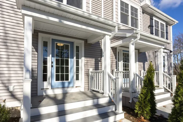 a view of a building with a glass door