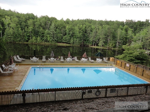 Bear Paw Road Deep Gap, NC 28618 - Photo 41 of 47 a view of swimming pool with outdoor seating