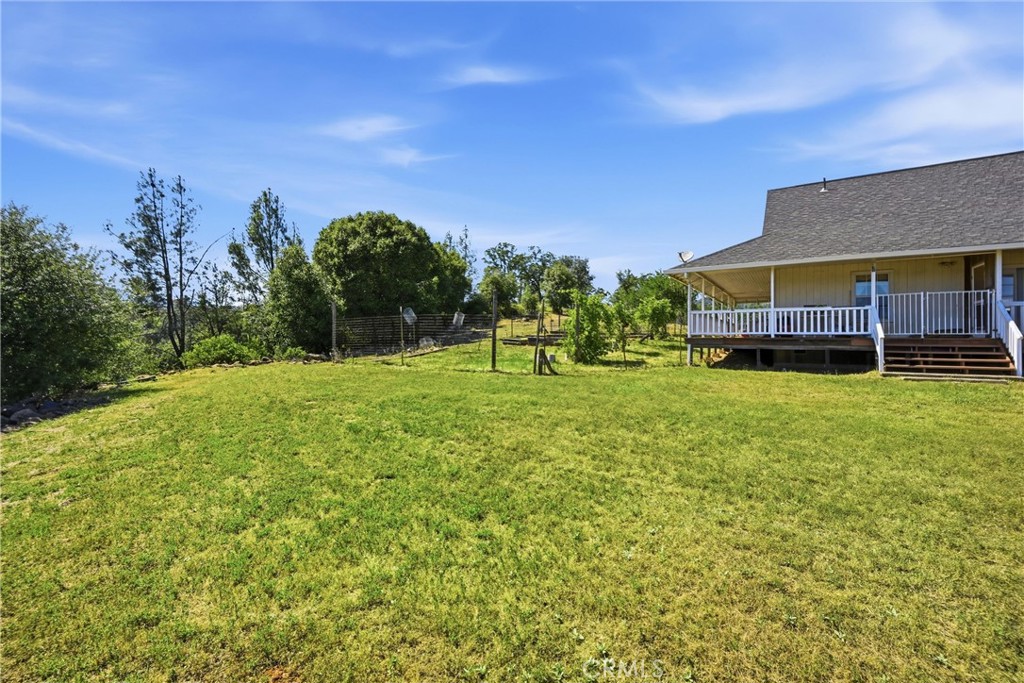 16965 Spruce Grove Road Hidden Valley Lake, CA 95467 - Photo 20 of 34 a view of a house with a big yard