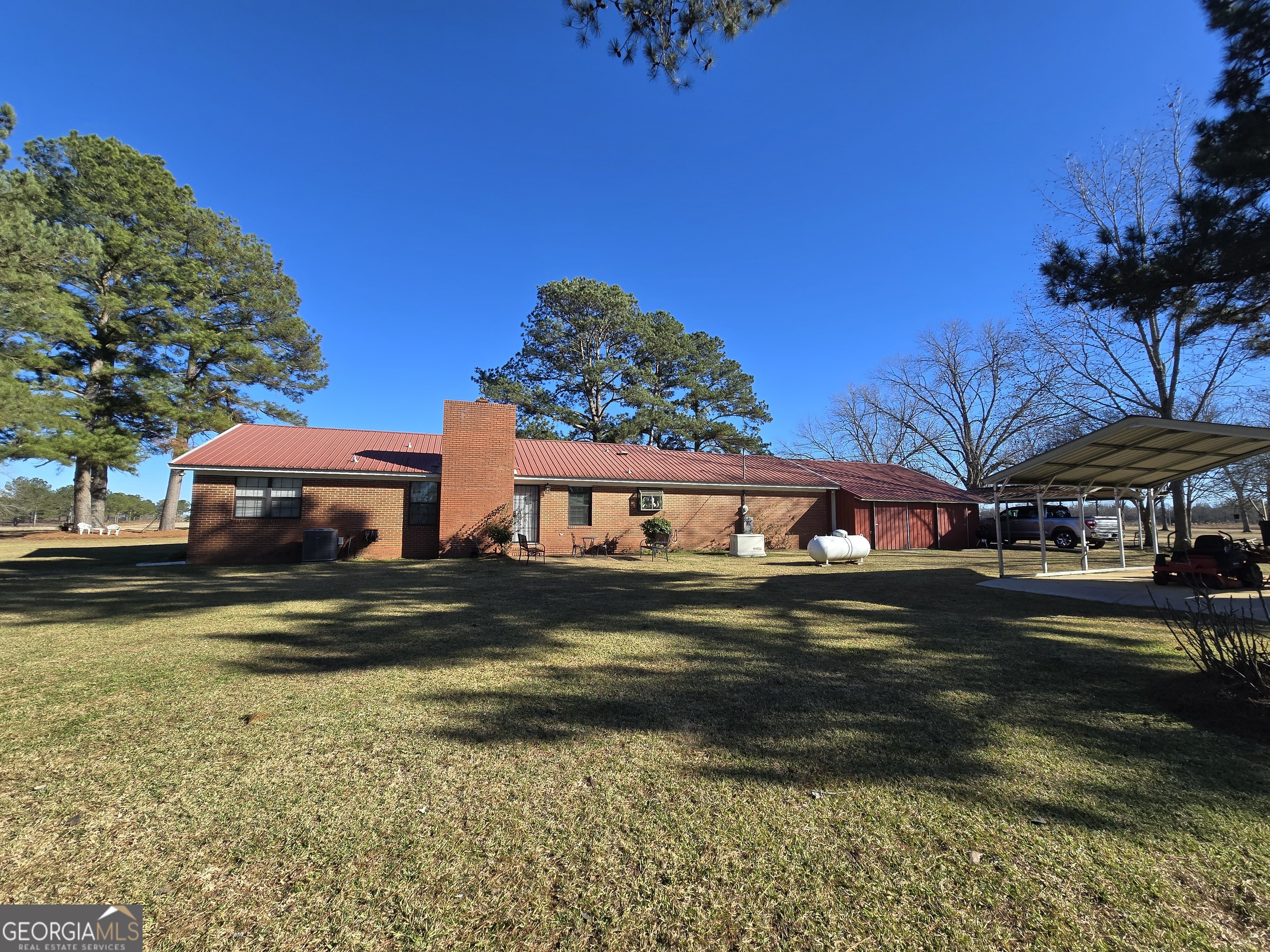 479 Mitchell Loop Bluffton, GA 39824 - Photo 8 of 51 a front view of a house with a yard