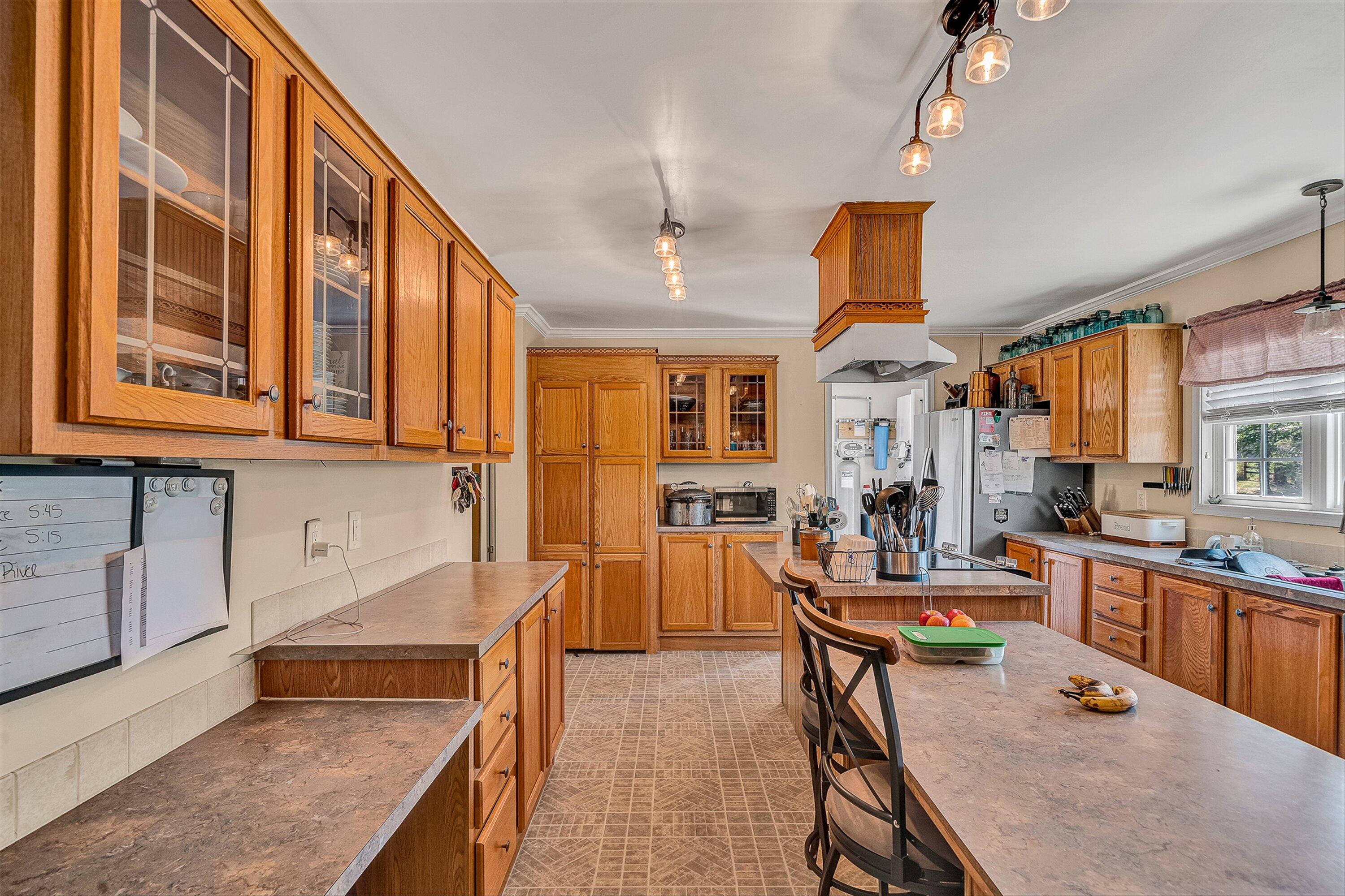 159 Simmons Creek Road Union Hall, VA 24176 - Photo 8 of 55 a very nice looking kitchen with a large window and stainless steel appliances
