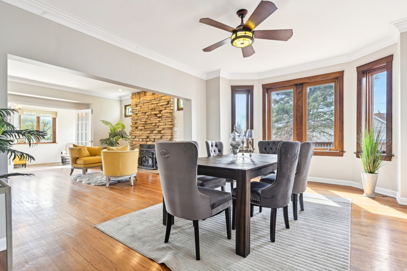 1420 Oakton Street Park Ridge, IL 60068 - Photo 12 of 62 a view of a dining room with furniture window and wooden floor