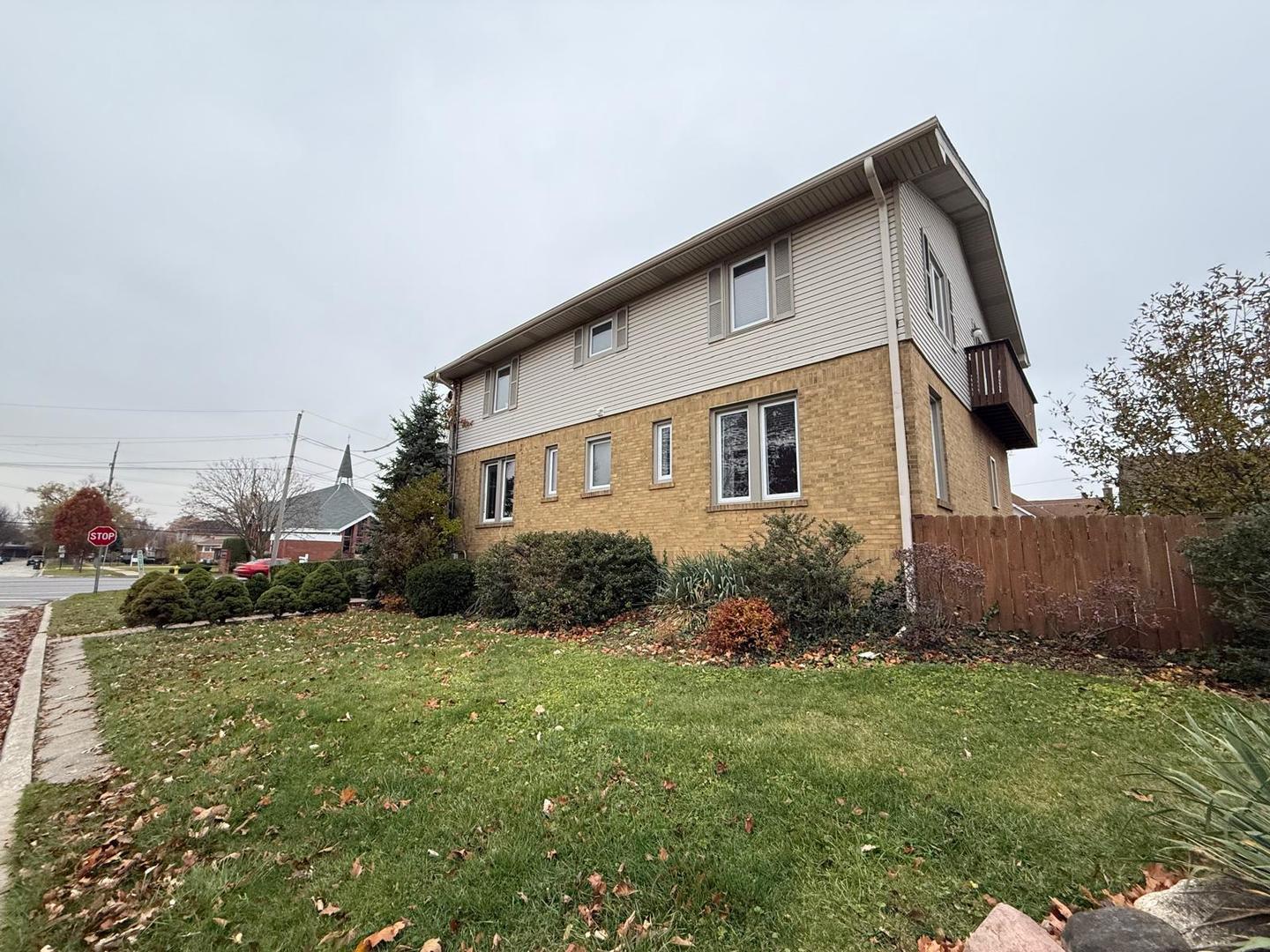 1420 Oakton Street Park Ridge, IL 60068 - Photo 2 of 62 a front view of a house with garden
