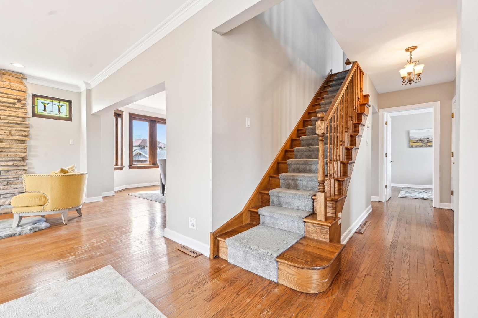 1420 Oakton Street Park Ridge, IL 60068 - Photo 21 of 62 a view of an entryway with wooden floor and staircase