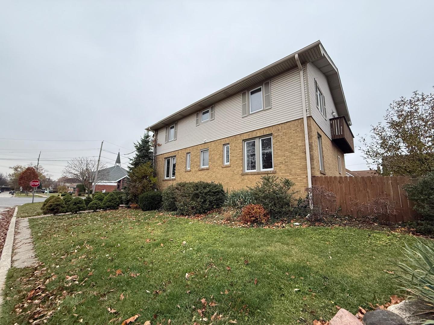 1420 Oakton Street Park Ridge, IL 60068 - Photo 3 of 62 a front view of a house with garden