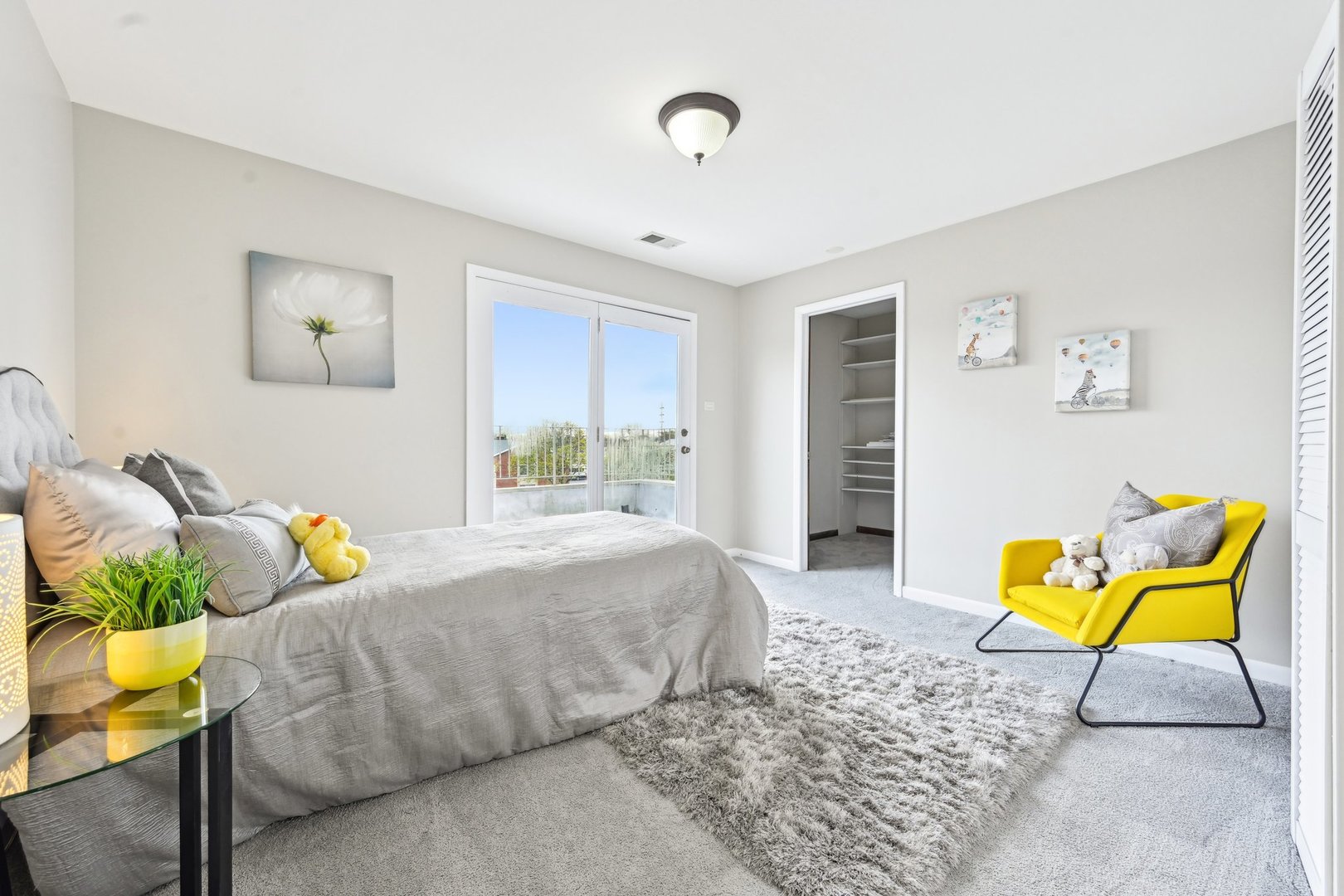 1420 Oakton Street Park Ridge, IL 60068 - Photo 35 of 62 a bedroom with a bed and a couch