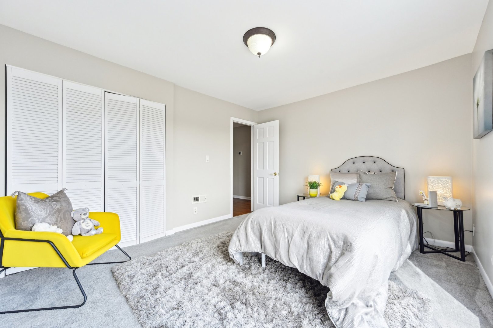 1420 Oakton Street Park Ridge, IL 60068 - Photo 36 of 62 a bedroom with a bed and a couch