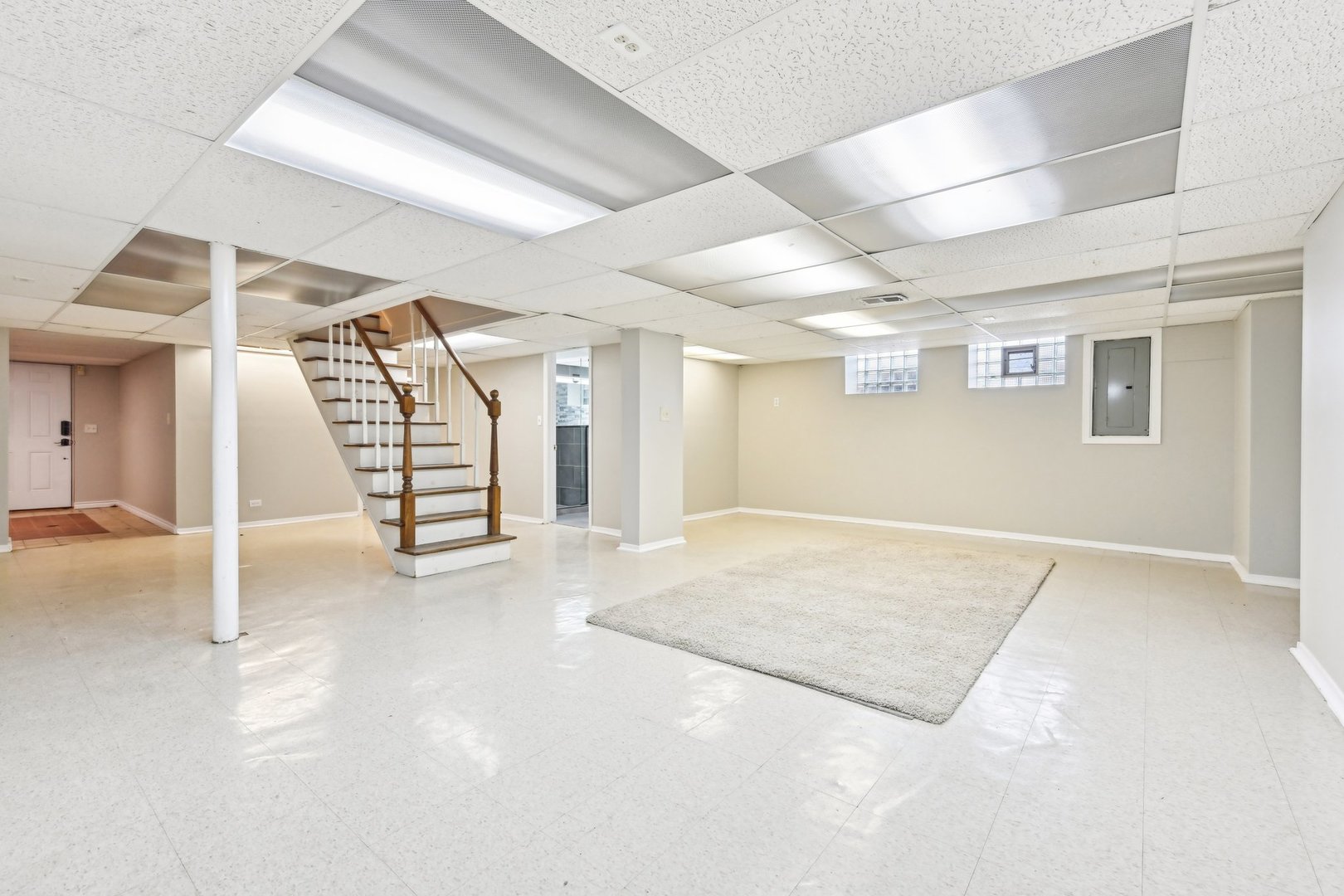 1420 Oakton Street Park Ridge, IL 60068 - Photo 44 of 62 a view of livingroom with stairs and a ceiling fan