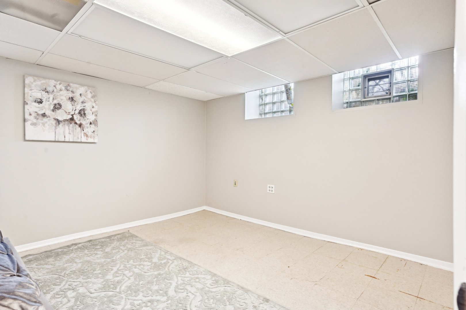 1420 Oakton Street Park Ridge, IL 60068 - Photo 48 of 62 a view of a wall with a painting on the wall