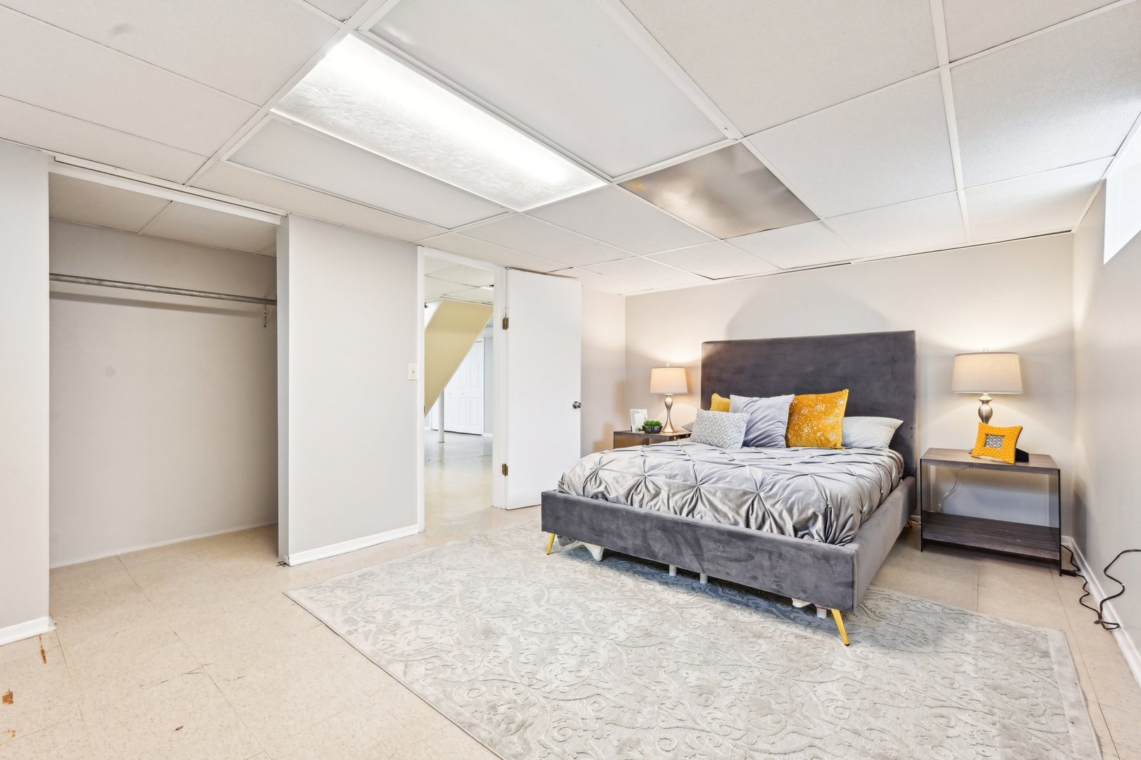 1420 Oakton Street Park Ridge, IL 60068 - Photo 50 of 62 a spacious bedroom with a bed and a window