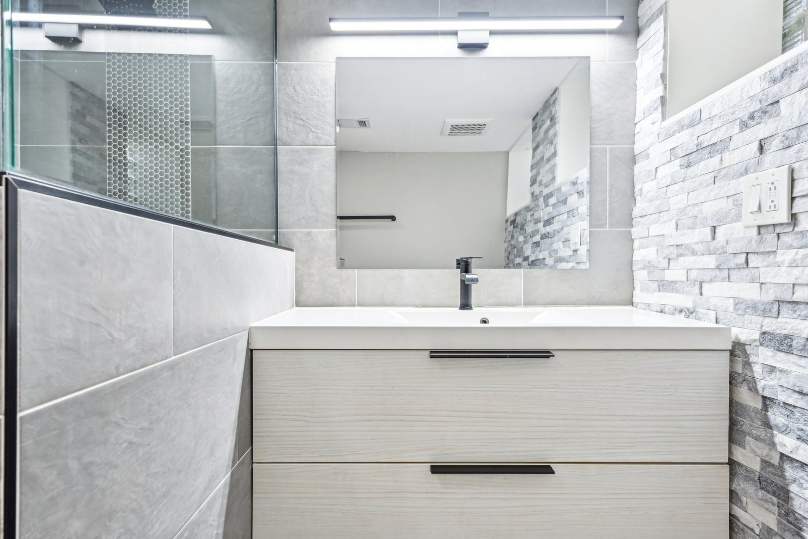 1420 Oakton Street Park Ridge, IL 60068 - Photo 52 of 62 a bathroom with a sink and a mirror