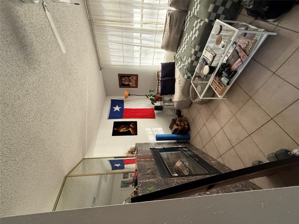8311 Hathaway Drive, Unit A Austin, TX 78757 - Photo 1 of 6 a living room with furniture and a window